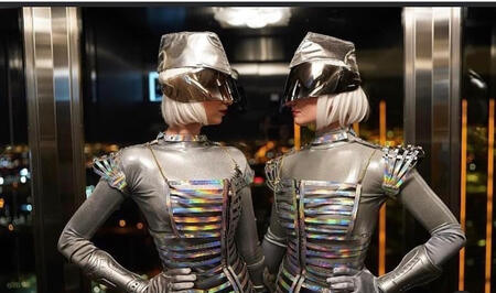 Two women dressed as Space Theme